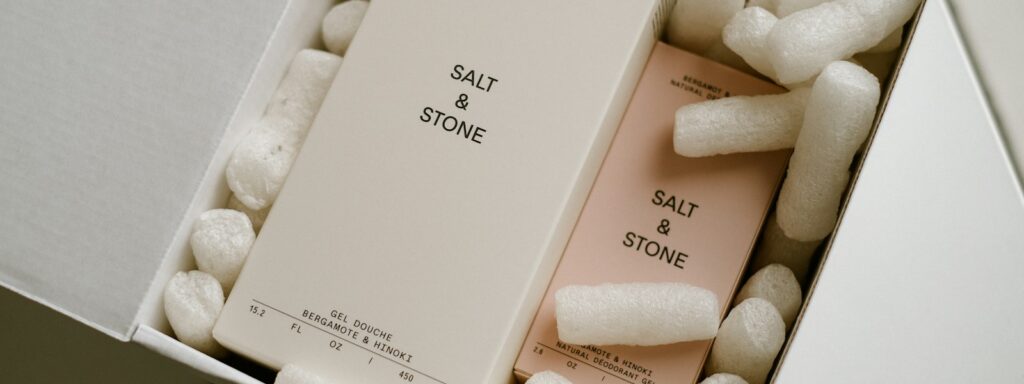 a white box filled with white and pink items