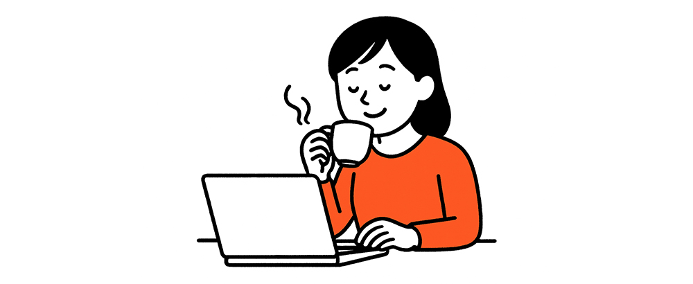 PCの前で優雅にお茶を飲んでいる人